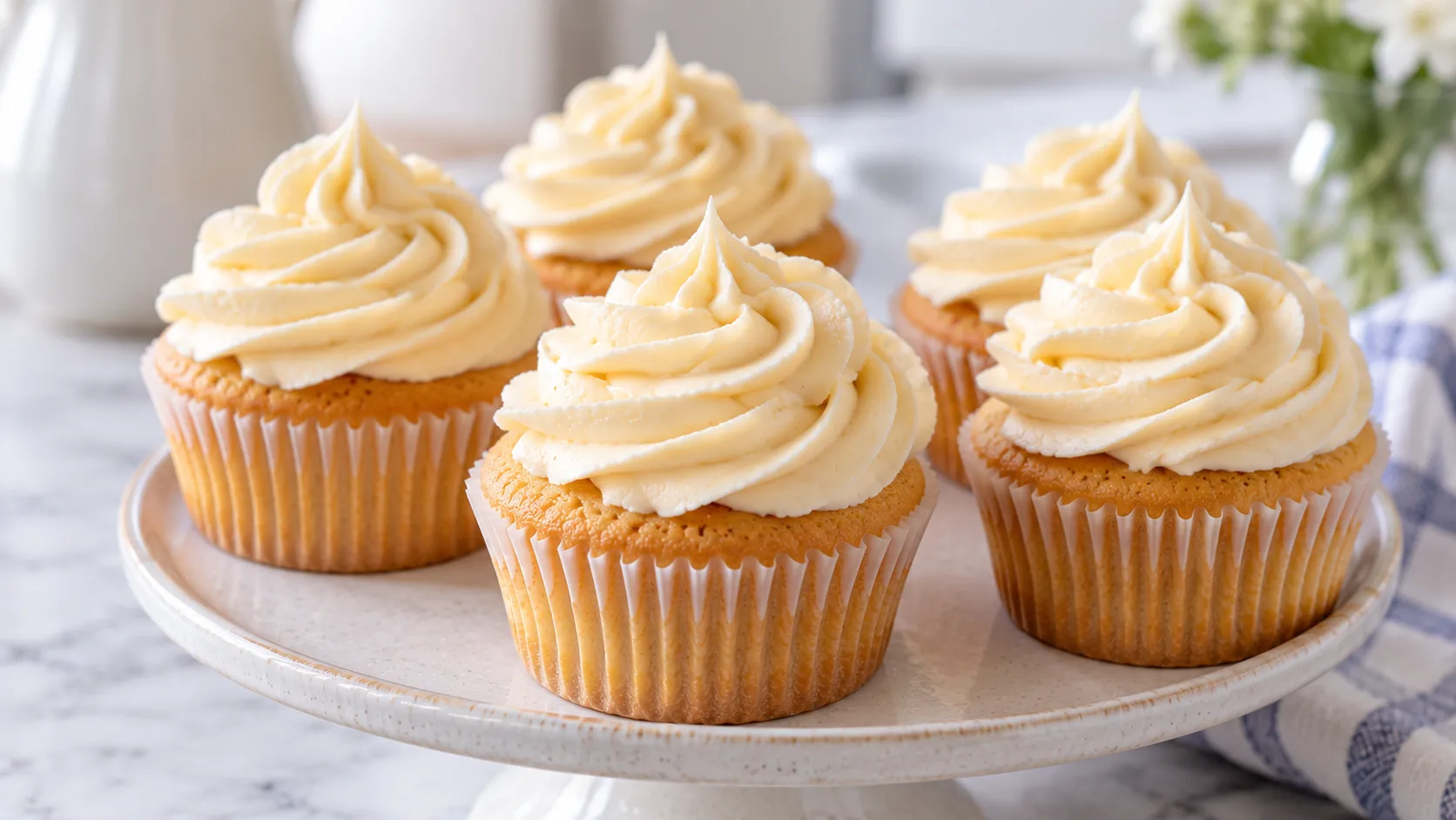 Mary Berry Buttercream Icing piped in smooth swirls on top of a cupcake
